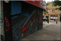 TQ3482 : View of shutter art on the front of Mac Shack on Bethnal Green Road by Robert Lamb