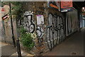 View of street art on the abutment of the railway bridge on Bethnal Green Road