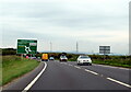 SW8453 : A30 eastbound approaching Carland Cross island for A39 by Roy Hughes