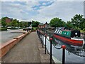 Narrow boat beside Furzton Lake hotel and pub