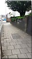 Looking NE along Wigton Road at the site of bridge of dismantled railway