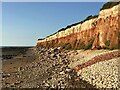 TF6741 : Hunstanton cliffs - Red, white and blue. by Richard Humphrey