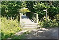NY3952 : Footbridge over River Caldew at junction of footpaths by Luke Shaw