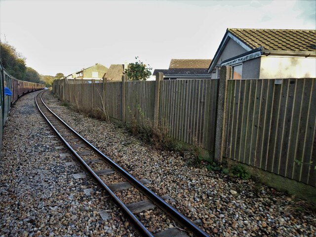 View from a Romney-Dungeness train - Passing back gardens in Shepherd's Walk