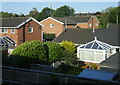 Houses on Shrewsbury Way from a passing train