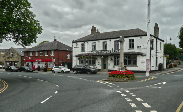 The post office, the Gascoigne Arms and the war memorial cross, Barwick-in-Elmet