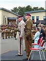 Prince Charles takes the salute