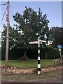 Signpost at junction of Oak Road and Priest Lane, Mottram St Andrew