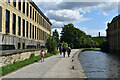 Leeds and Liverpool Canal towpath beside the New Mill, Saltaire