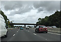 Bridge crossing the M4, with average speed camera next to it