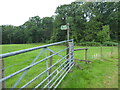 Footpath sign at the field boundary