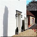 Yard and door near the junction of School Road and Church Street