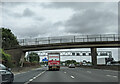 Almost at junction 21 on the clockwise M25, going under a footbridge