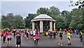 Runners in Macclesfield parkrun assemble by the bandstand in South Park