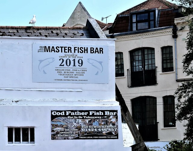 Fish bar signs overlooking the Cornwallis Street car park, Hastings