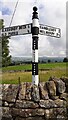 Cumberland County Council signpost at road fork at east end of Glassonby