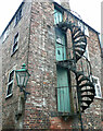 SK9771 : Spiral staircase and street light, Lincoln by Humphrey Bolton
