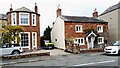 Acorn Bank and Manor Cottage on north side of road