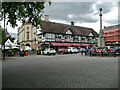 Caf?, shops and war memorial, Market Place, Sleaford