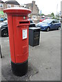 ST6671 : Pillar box on School Road by Neil Owen