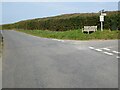 Memorial seat and road sign