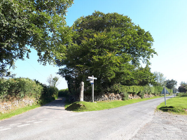 Road junction near Huckworthy Common, with stone cross and signpost