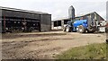 Farm buildings and vehicles at Crosby Court Grange