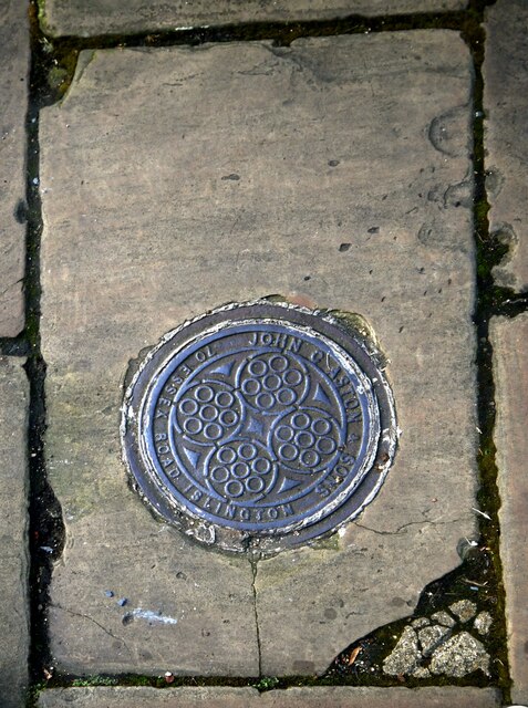 A relic of the coal age: paving slab with coal-hole cover, Canonbury Square