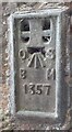 Benchmark on building at Golden Fleece