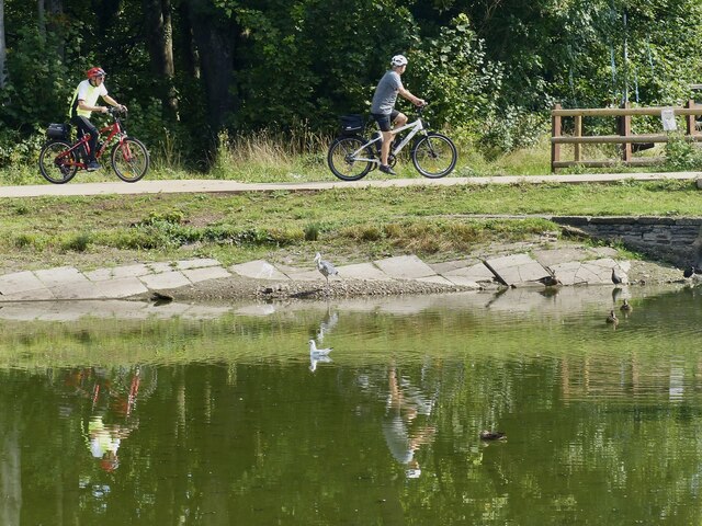 Cyclists, heron and reflections, Fourteen Locks, Newport