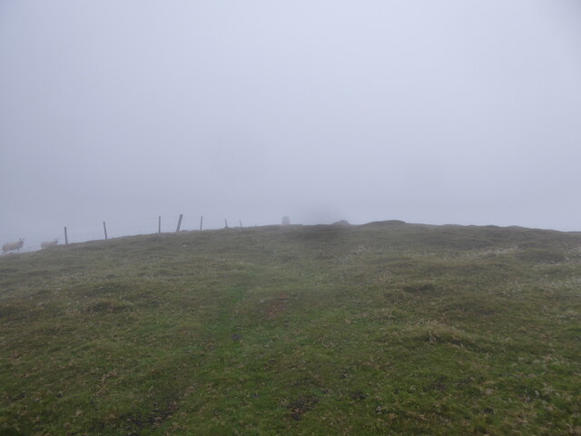 Approaching the summit trig on Corndon Hill in low cloud