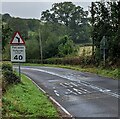 Warning sign on the approach to a bend in Usk Road, Mynydd-bach, Monmouthshire