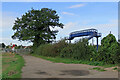 TL4653 : Great Shelford: track, tree and footbridge by John Sutton