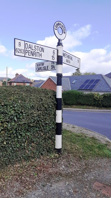Cumberland County Council finger signpost at T-junction in Cumwhinton
