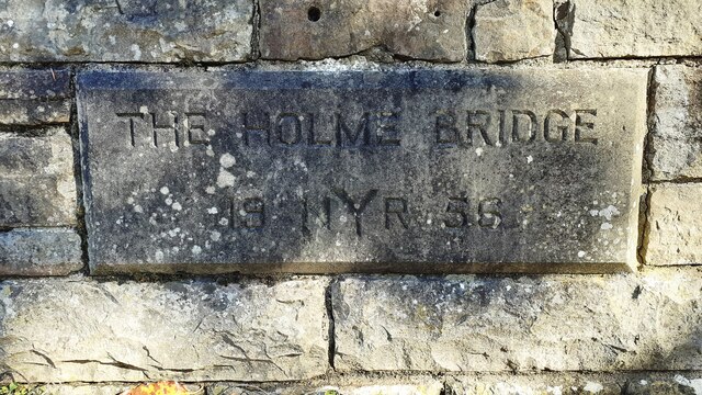 Plaque on north parapet of bridge taking A684 over Gayle Beck