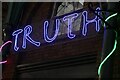 View of "Truth" neon lights in Covent Garden Piazza