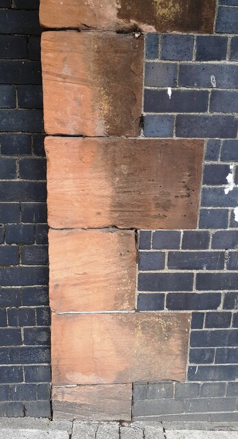 Quoins of former bridge of dismantled railway on NW side of Wigton Road