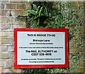 Sign on railway bridge over Bishop