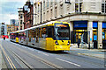 SJ8398 : Metrolink Tram on Cross Street by David Dixon