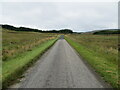 NC3007 : Road (A837) near to Ln Cnoc Chaornaidh by Peter Wood