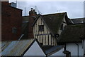 View of the rear of shops on Dogs Head Street from St. Stephen