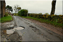 H4868 : Large pothole along Camowen Road by Kenneth  Allen