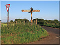 Restored signpost near Glassford