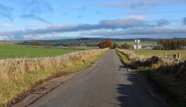 Road heading towards Flagg Moor Farm