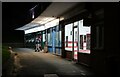 Row of shops at night in Broomgrove, Hastings