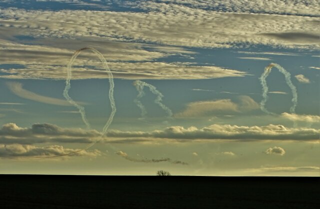 Military contrails fading in a Lincolnshire sky