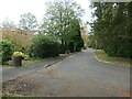 Residential road parallel to a through route