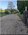 Stone lion at the entrance to Grey Squirrels, Llandegveth