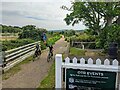 SZ3589 : Cyclists on path (former train line) by 'Off The Rails' café in Yarmouth, Isle of Wight by Calum Rogers