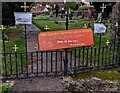 ST4391 : Banner and notices on churchyard entrance gates, Llanvaches by Jaggery